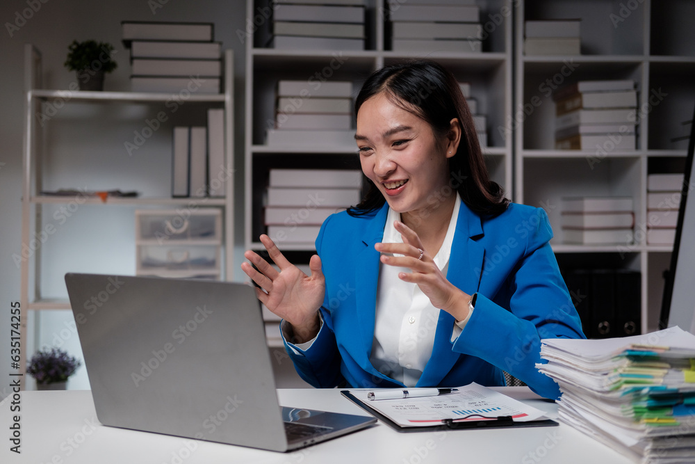 Woman having an online business meeting in an office. Woman having an online business meeting in an office.