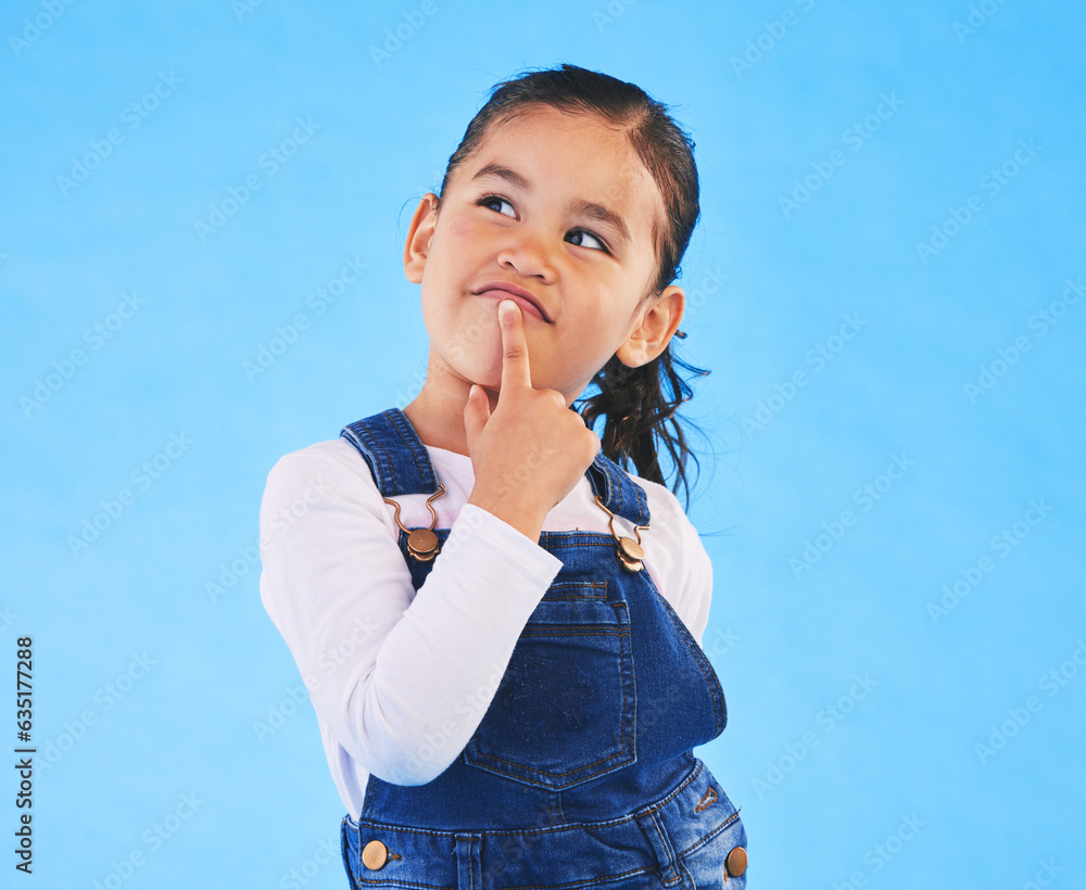 Thinking, kid and girl with ideas, decision and problem solving on a blue studio background. Mockup space, child and model with doubt, planning and inspiration with questions, remember or opportunity Thinking, kid and girl with ideas, decision and problem solving on a blue studio background. Mockup space, child and model with doubt, planning and inspiration with questions, remember or opportunity