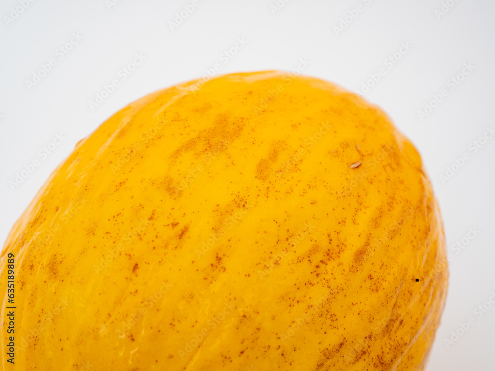 Fresh melon on a white background. Melon close-up. Fresh melon on a white background. Melon close-up.