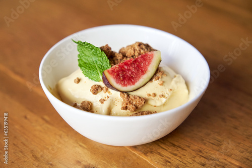 Bowl with prickly pear mousse with gofio crumble photo