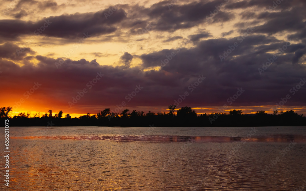 Sunset scene by the Saint-Lawrence River, near Montreal, Quebec, Canada