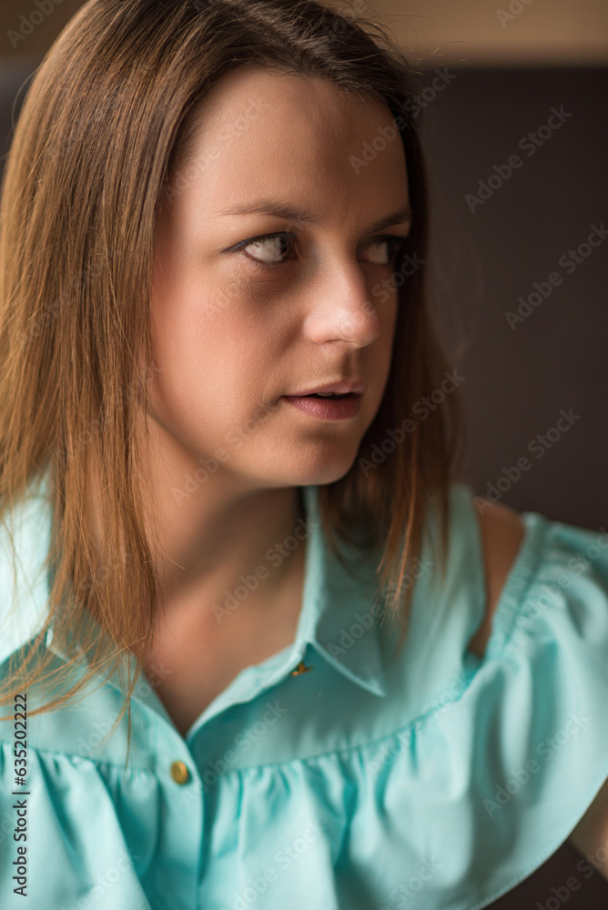 Close-up portrait of a beautiful young girl with long hair. Close-up portrait of a beautiful young girl with long hair.