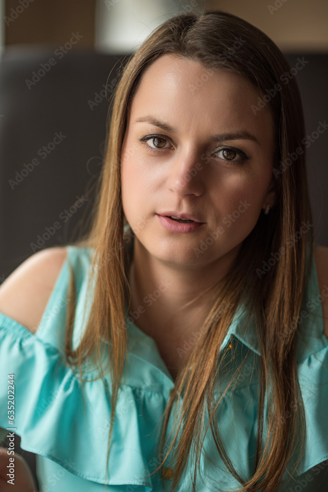 Close-up portrait of a beautiful young girl with long hair. Close-up portrait of a beautiful young girl with long hair.