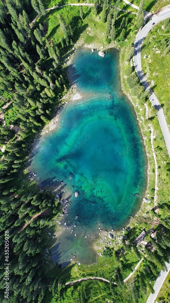drone photo Carezza lake, lago di carezza dolomites italy europe
