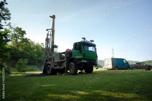Cuadro en lienzo Water well drilling rig preparing to boring dowin into the earth.