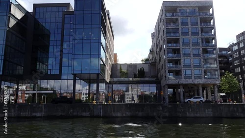 Stockholm, Sweden modern residential and office buildings in the Hammarby district seen from a canal.  photo