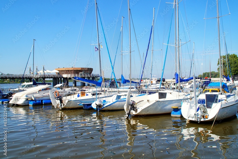 Yachts moored in the marina on the Vistula River in Płock. Yachts moored in the marina on the Vistula River in Płock.