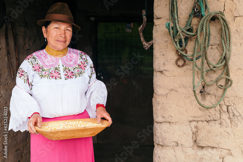 indigenous woman holding corn photo