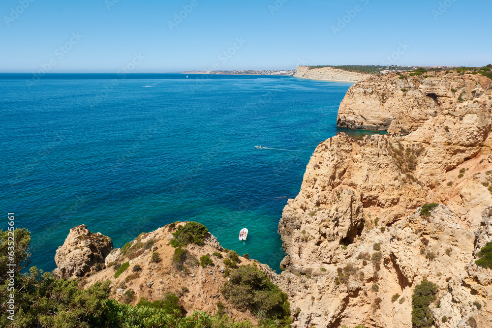 Typical view of the Lagos coastline. Panoramic view of the Algarve shore, Portugal