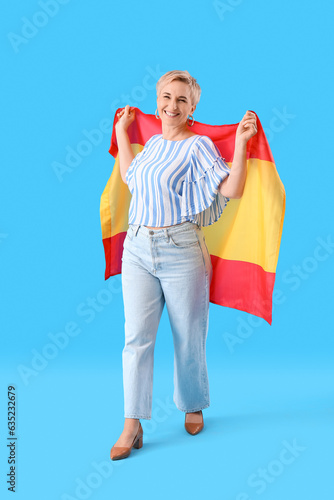 Happy mature woman with fla...