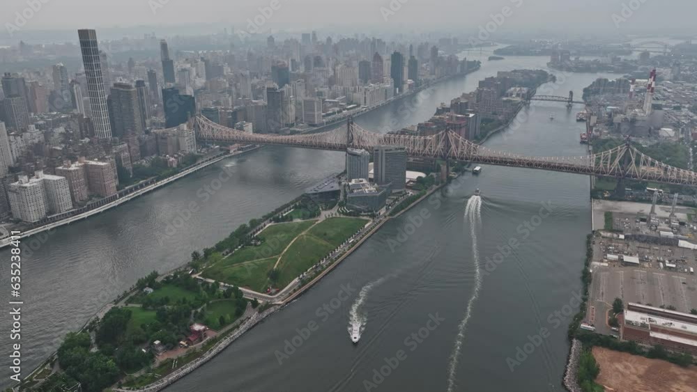 An aerial view of a city and a bridge An aerial view of a city and a bridge