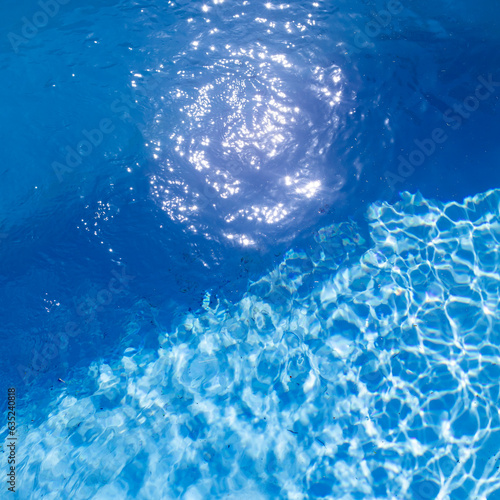 photography of a colorful pool water surface with textured