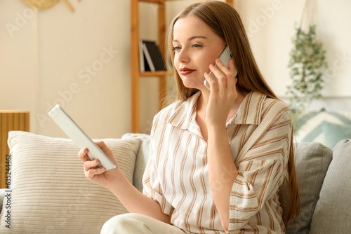 Working young woman with ta...