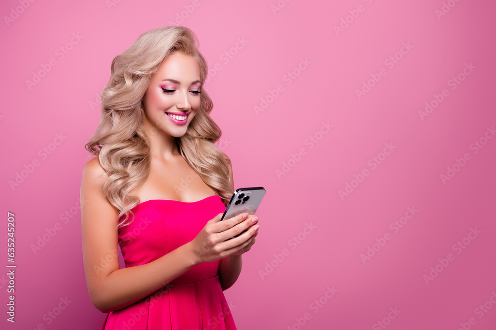 Photo of gorgeous sweet lady in doll style look using gadget browsing boutique store website on pink background Photo of gorgeous sweet lady in doll style look using gadget browsing boutique store website on pink background