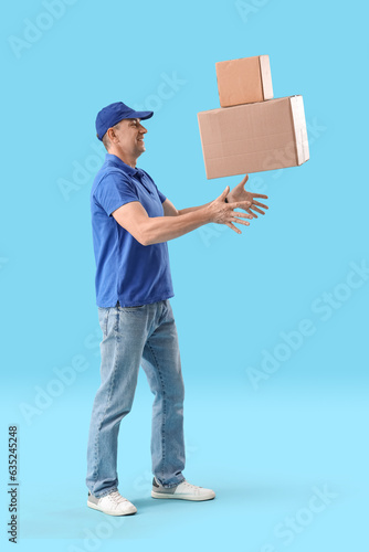 Mature courier throwing par...