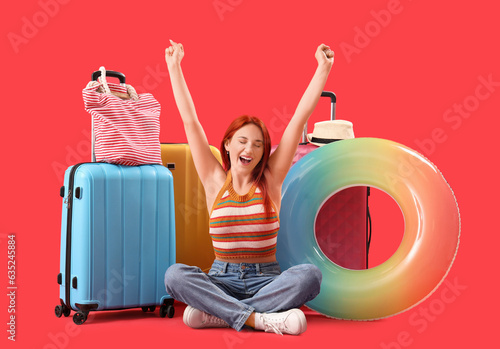 Happy female tourist with l...