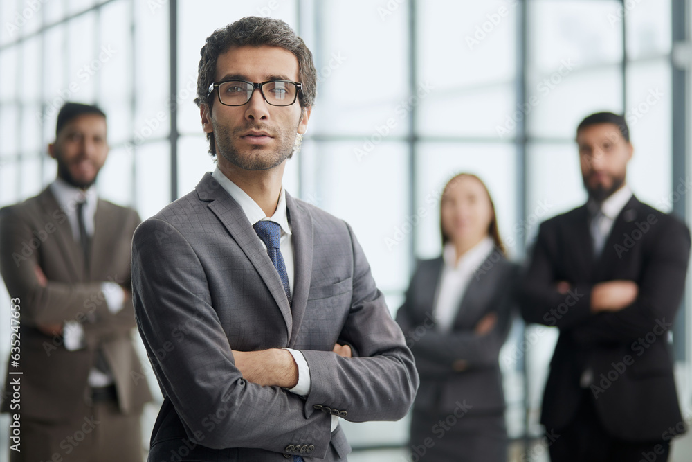 Line of serious multiethnic business man and women looking at camera.