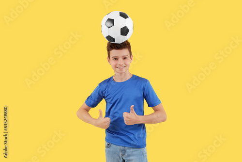 Little boy with soccer ball...