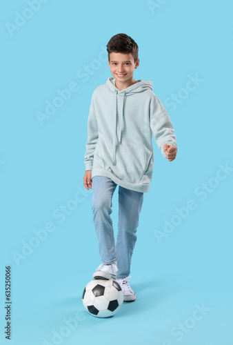 Little boy with soccer ball...
