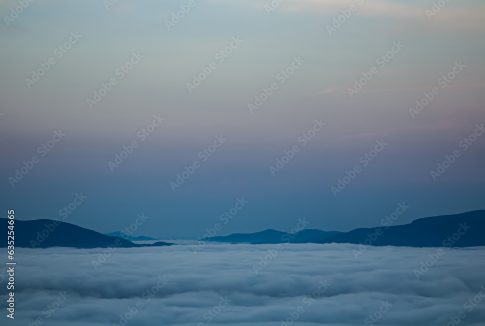 Landscape of mountains under the clouds. Landscape of mountains under the clouds.