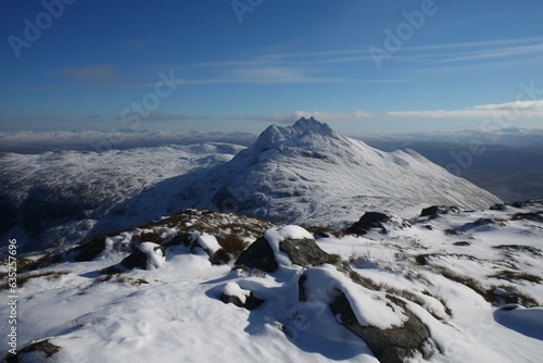 Majestic peaks in the distance calling forth. Generative AI