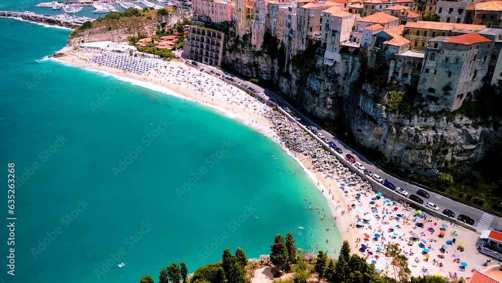 Aerial view of traditional Italian town Tropea, Italy with its turquoise waters, rugged cliffs, 