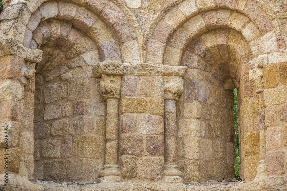 Stone wall of an old Romanesque church