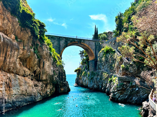 Hidden beauty of Furore bridge , Amalfi coast in Italy. Famous fjord-like coastline and vibrant houses clinging to the cliffs offer a glimpse into the stunning uniqueness of this Italian village photo