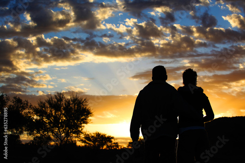 A couple enjoy the sunset in Australia