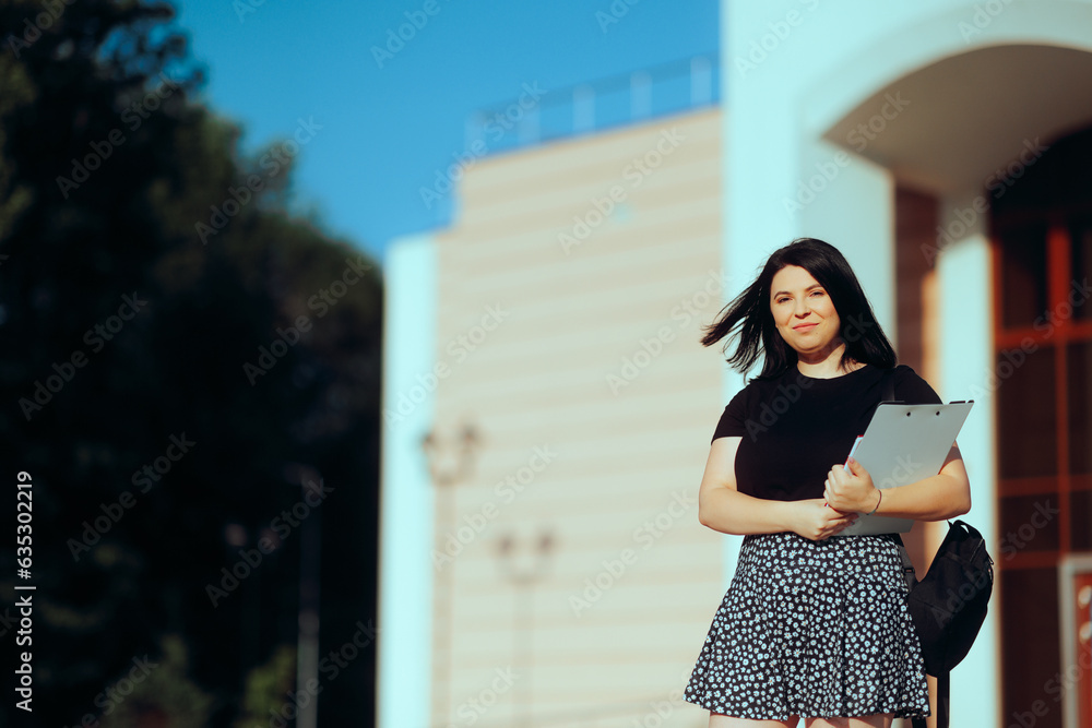 Smiling University Student Walking Outdoors in Campus. Happy girl going back to school holding her textbooks
Smiling University Student Walking Outdoors in Campus. Happy girl going back to school holding her textbooks