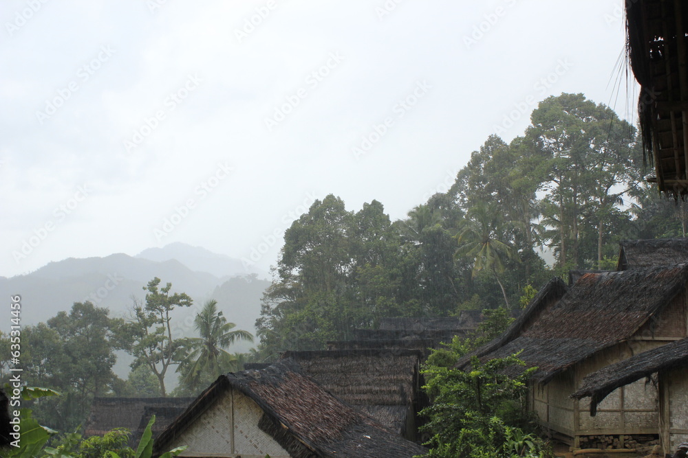 photo illustration of a thatched roof wooden house and a quiet natural setting in a baduy inland village isolated from technology photo illustration of a thatched roof wooden house and a quiet natural setting in a baduy inland village isolated from technology