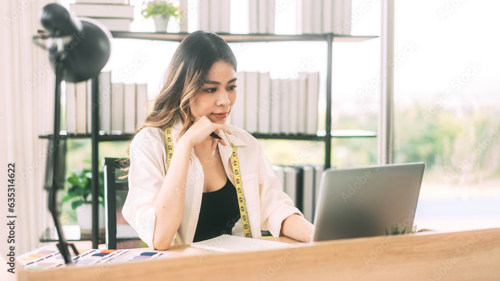 Southeast asian woman designer teach online to student study via internet about fashion design
