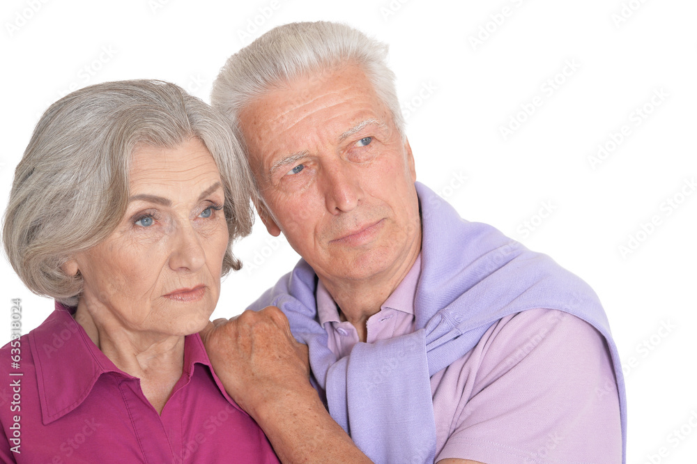 Portrait of sad senior couple isolated