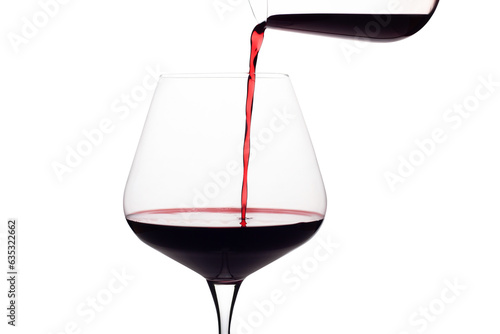 red wine pouring into glass