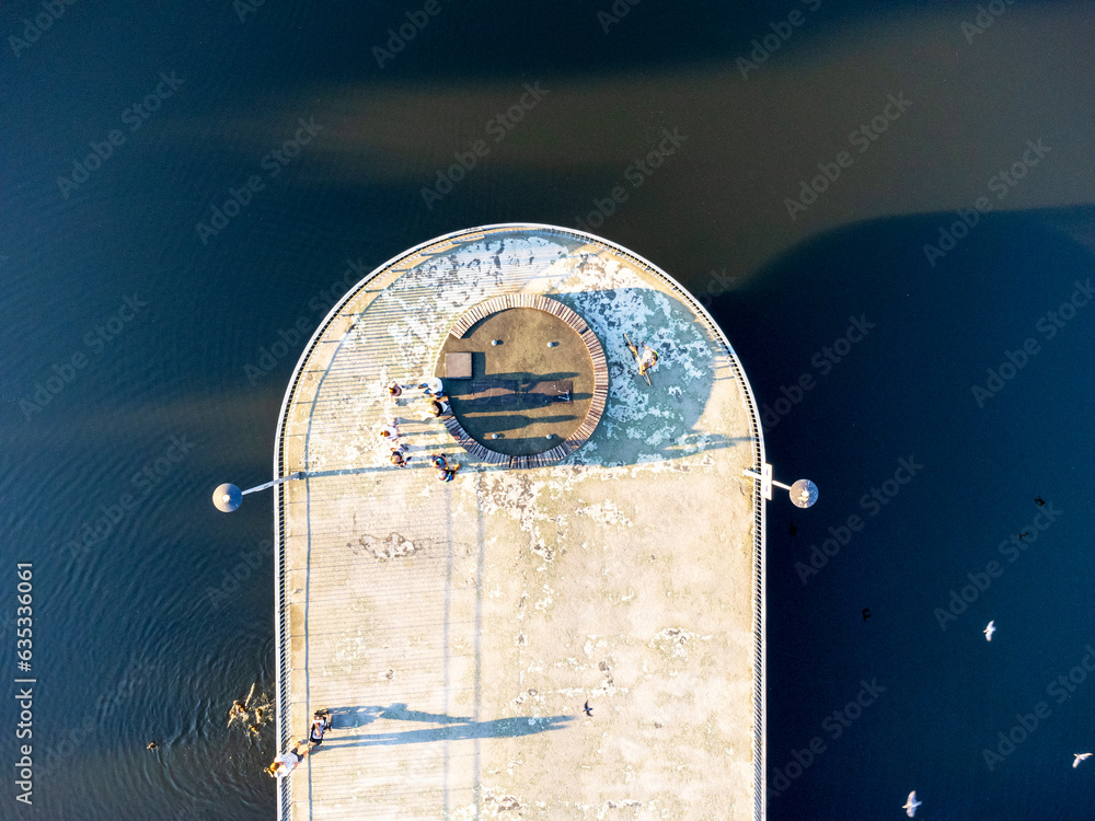 Aerial View from above , concrete platform entering the lake