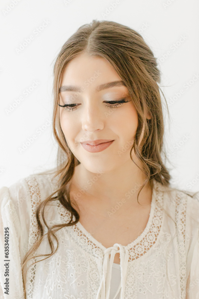 hispanic woman in bridal dress with hair and makeup done hispanic woman in bridal dress with hair and makeup done