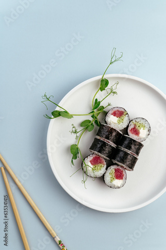 Classic Japanese sushi rolls with salmon photo