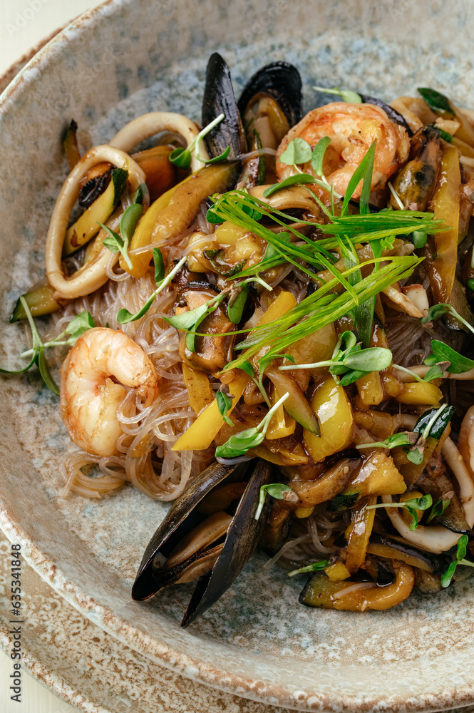 Fototapeta premium asian noodles with seafood. restaurant menu