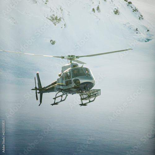 Square crop of helicopter flying in mid-air