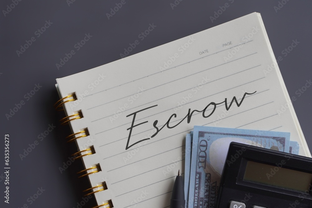 Ταπετσαρία Close up image of calculator and money with text ESCROW