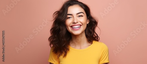 Happy and confident young woman proudly displaying a concept on copy space