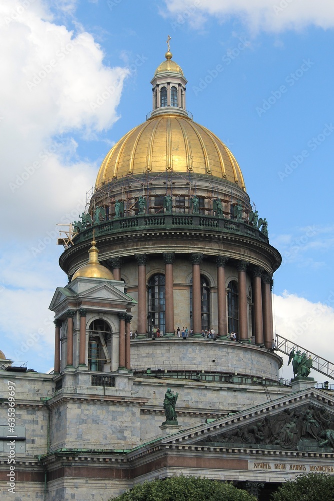 Saint Petersburg. Russia. St. Isaac's Cathedral on a Sunny summer day. Lilac blossom on St. Isaac's square. St. Isaac's Cathedral on the background of blooming lilacs. Architecture Of St. Petersburg