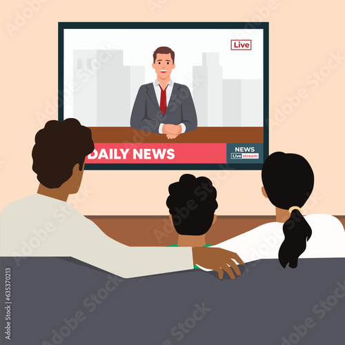 Breaking news concept. Back view of family couple and children sitting on sofa in living room, watching TV news with host interviewing guest.