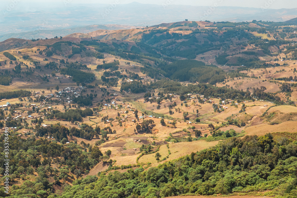 View of a valley against mountains seen from Mbeya Peak, Mbeya Mountain range in Mbeya Region, Tanzania