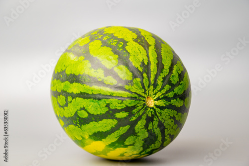 Watermelon whole on grey background