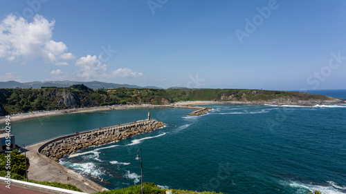 Luarca, pueblo marinero de Asturias. Faro y entrada del puerto photo