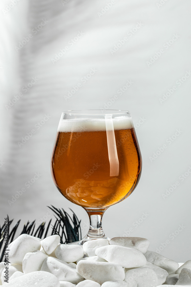 Beer with foam splash. Freeze motion splash drops of beer foam Beer with foam splash. Freeze motion splash drops of beer foam