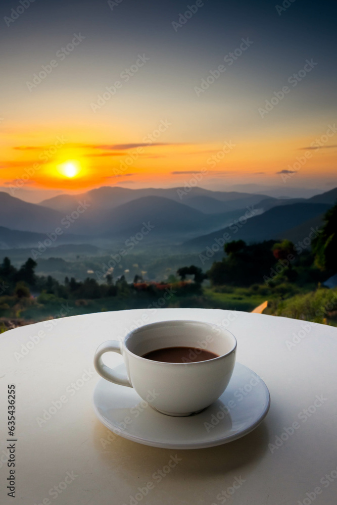 Cup of coffee on table, nature view in morning, Chiang Mai, Thailand