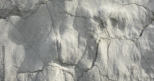 The texture of the stone close-up. Rough rock wall. High quality 4k footage