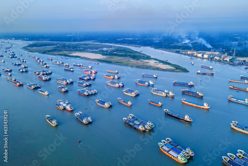 Slika na platnu Hundreds of vessels are seen anchored in Karnafuli river near port in Chattogram